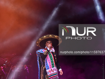 Aida Cuevas with the Mariachi Real de la Montana performs during the Maraton de Mariachis de la Ciudad de Mexico at Zocalo main square, whos...