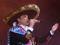 Aida Cuevas with the Mariachi Real de la Montana performs during the Maraton de Mariachis de la Ciudad de Mexico at Zocalo main square, whos...