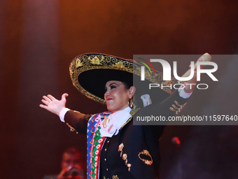 Aida Cuevas with the Mariachi Real de la Montana performs during the Maraton de Mariachis de la Ciudad de Mexico at Zocalo main square, whos...