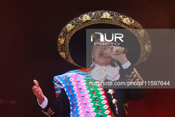 Aida Cuevas with the Mariachi Real de la Montana performs during the Maraton de Mariachis de la Ciudad de Mexico at Zocalo main square, whos...