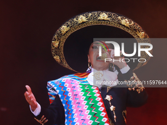 Aida Cuevas with the Mariachi Real de la Montana performs during the Maraton de Mariachis de la Ciudad de Mexico at Zocalo main square, whos...