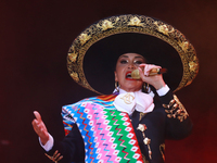 Aida Cuevas with the Mariachi Real de la Montana performs during the Maraton de Mariachis de la Ciudad de Mexico at Zocalo main square, whos...