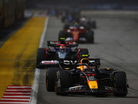 Sergio Perez of Mexico drives the Red Bull Racing-Honda RBPT RB20 during the F1 Grand Prix of Singapore at Marina Bay Street Circuit in Sing...