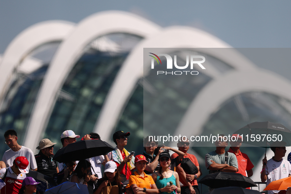 Fans watch ahead of the F1 Grand Prix of Singapore at Marina Bay Street Circuit in Singapore, Singapore, on September 22, 2024. 