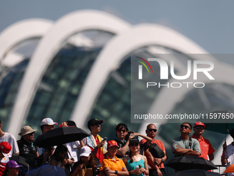 Fans watch ahead of the F1 Grand Prix of Singapore at Marina Bay Street Circuit in Singapore, Singapore, on September 22, 2024. (