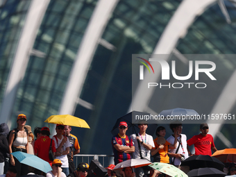 Fans watch ahead of the F1 Grand Prix of Singapore at Marina Bay Street Circuit in Singapore, Singapore, on September 22, 2024. (