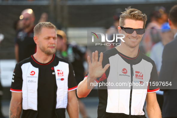 Nico Hulkenberg of Germany and MoneyGram Haas F1 Team participates in the drivers' parade ahead of the F1 Grand Prix of Singapore at Marina...