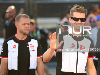 Nico Hulkenberg of Germany and MoneyGram Haas F1 Team participates in the drivers' parade ahead of the F1 Grand Prix of Singapore at Marina...