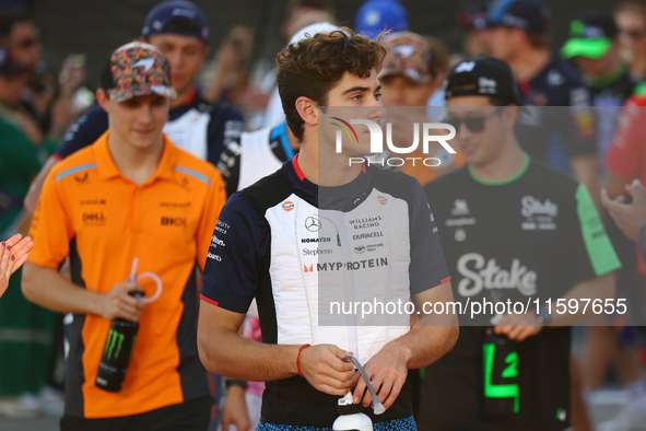 Franco Colapinto of Argentina and Williams Racing participates in the drivers' parade ahead of the F1 Grand Prix of Singapore at Marina Bay...