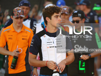 Franco Colapinto of Argentina and Williams Racing participates in the drivers' parade ahead of the F1 Grand Prix of Singapore at Marina Bay...