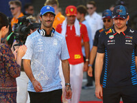 Daniel Ricciardo of Australia and Visa Cash App RB F1 Team and Max Verstappen of the Netherlands and Red Bull Racing-Honda RBPT appear durin...