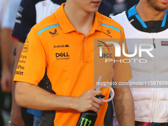 Oscar Piastri of Australia and the McLaren Formula 1 Team participate in the drivers' parade before the F1 Grand Prix of Singapore at Marina...