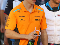 Oscar Piastri of Australia and the McLaren Formula 1 Team participate in the drivers' parade before the F1 Grand Prix of Singapore at Marina...