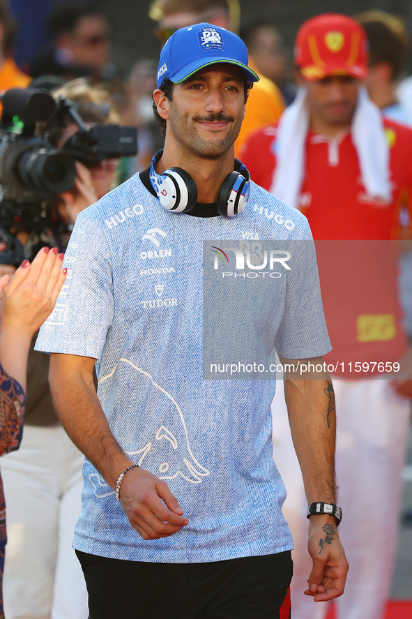 Daniel Ricciardo of Australia and Visa Cash App RB F1 Team participates in the drivers parade ahead of the F1 Grand Prix of Singapore at Mar...