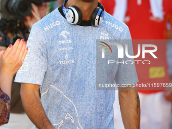 Daniel Ricciardo of Australia and Visa Cash App RB F1 Team participates in the drivers parade ahead of the F1 Grand Prix of Singapore at Mar...