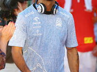 Daniel Ricciardo of Australia and Visa Cash App RB F1 Team participates in the drivers parade ahead of the F1 Grand Prix of Singapore at Mar...