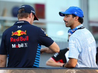 Max Verstappen of the Netherlands and Red Bull Racing-Honda RBPT and Daniel Ricciardo of Australia and Visa Cash App RB F1 Team appear durin...