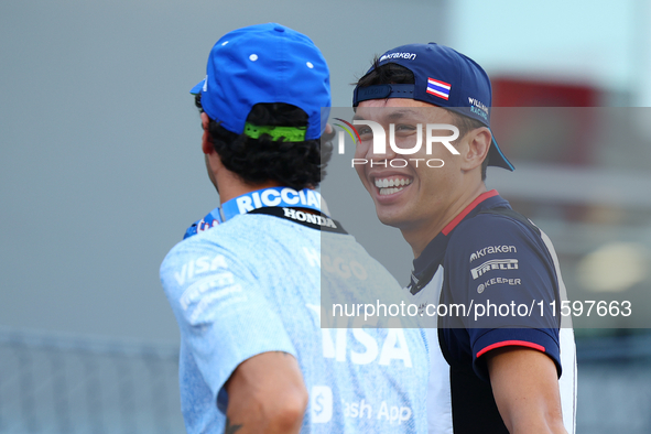 Alex Albon of Thailand and Williams Racing reacts during the drivers' parade ahead of the F1 Grand Prix of Singapore at Marina Bay Street Ci...