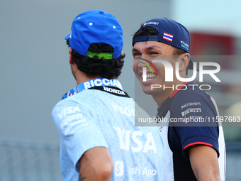 Alex Albon of Thailand and Williams Racing reacts during the drivers' parade ahead of the F1 Grand Prix of Singapore at Marina Bay Street Ci...