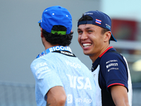 Alex Albon of Thailand and Williams Racing reacts during the drivers' parade ahead of the F1 Grand Prix of Singapore at Marina Bay Street Ci...