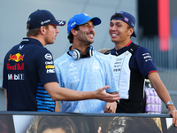 Daniel Ricciardo of Australia and Visa Cash App RB F1 Team reacts during the drivers' parade ahead of the F1 Grand Prix of Singapore at Mari...