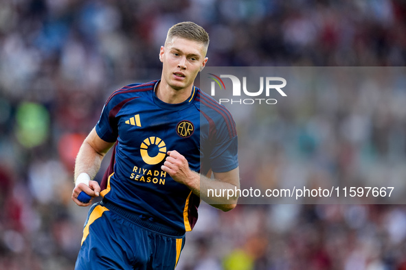 Artem Dovbyk of AS Roma celebrates after scoring first goal during the Serie A Enilive match between AS Roma and Udinese Calcio at Stadio Ol...