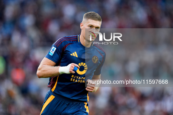 Artem Dovbyk of AS Roma celebrates after scoring first goal during the Serie A Enilive match between AS Roma and Udinese Calcio at Stadio Ol...