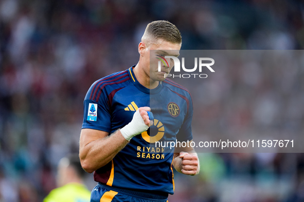 Artem Dovbyk of AS Roma celebrates after scoring first goal during the Serie A Enilive match between AS Roma and Udinese Calcio at Stadio Ol...