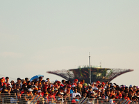 Fans watch during the drivers' parade ahead of the F1 Grand Prix of Singapore at Marina Bay Street Circuit in Singapore, Singapore, on Septe...