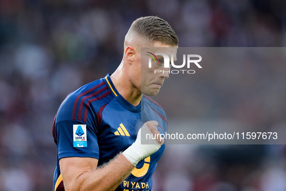 Artem Dovbyk of AS Roma celebrates after scoring first goal during the Serie A Enilive match between AS Roma and Udinese Calcio at Stadio Ol...