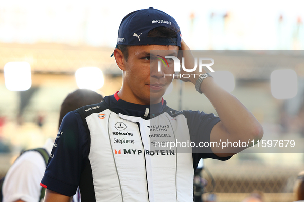 Alex Albon of Thailand and Williams Racing participates in the drivers' parade ahead of the F1 Grand Prix of Singapore at Marina Bay Street...