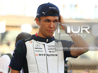 Alex Albon of Thailand and Williams Racing participates in the drivers' parade ahead of the F1 Grand Prix of Singapore at Marina Bay Street...