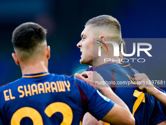 Artem Dovbyk of AS Roma celebrates after scoring first goal during the Serie A Enilive match between AS Roma and Udinese Calcio at Stadio Ol...