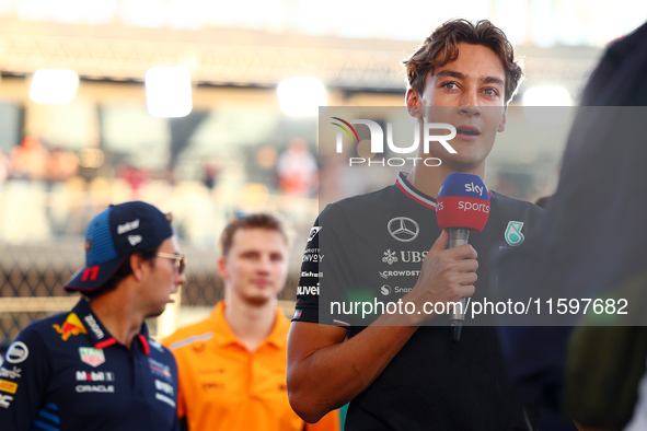 George Russell of the United Kingdom and Mercedes-AMG Petronas F1 Team participates in the drivers' parade ahead of the F1 Grand Prix of Sin...