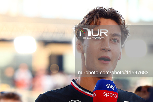 George Russell of the United Kingdom and Mercedes-AMG Petronas F1 Team participates in the drivers' parade ahead of the F1 Grand Prix of Sin...