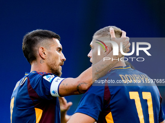 Artem Dovbyk of AS Roma celebrates after scoring first goal during the Serie A Enilive match between AS Roma and Udinese Calcio at Stadio Ol...