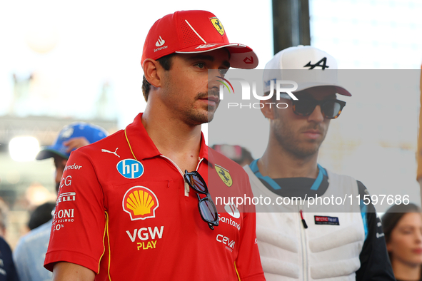 Charles Leclerc of Monaco and Scuderia Ferrari participates in the drivers' parade before the F1 Grand Prix of Singapore at Marina Bay Stree...