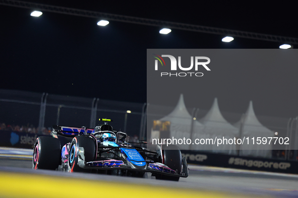 Pierre Gasly of France and BWT Alpine F1 Team drives to the grid ahead of the F1 Grand Prix of Singapore at Marina Bay Street Circuit in Sin...