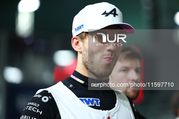 Pierre Gasly of France and BWT Alpine F1 Team stands on the grid ahead of the F1 Grand Prix of Singapore at Marina Bay Street Circuit in Sin...