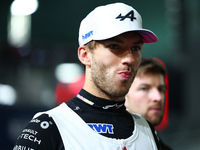 Pierre Gasly of France and BWT Alpine F1 Team stands on the grid ahead of the F1 Grand Prix of Singapore at Marina Bay Street Circuit in Sin...