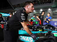 Lewis Hamilton of the United Kingdom drives the Mercedes-AMG Petronas F1 Team F1 W15 on the grid ahead of the F1 Grand Prix of Singapore at...