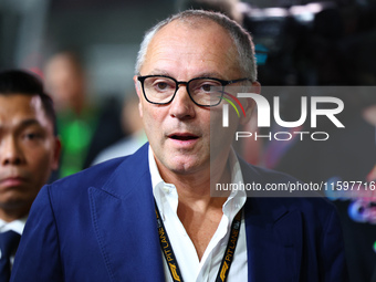 Stefano Domenicali, CEO of the Formula One Group, stands on the grid ahead of the F1 Grand Prix of Singapore at Marina Bay Street Circuit in...