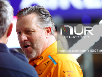 Zak Brown stands on the grid ahead of the F1 Grand Prix of Singapore at Marina Bay Street Circuit in Singapore, Singapore, on September 22,...