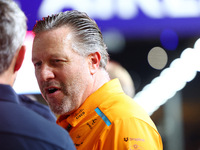 Zak Brown stands on the grid ahead of the F1 Grand Prix of Singapore at Marina Bay Street Circuit in Singapore, Singapore, on September 22,...