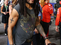 Lenny Kravitz walks on the grid ahead of the F1 Grand Prix of Singapore at Marina Bay Street Circuit in Singapore, Singapore, on September 2...