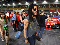 Lenny Kravitz walks on the grid ahead of the F1 Grand Prix of Singapore at Marina Bay Street Circuit in Singapore, Singapore, on September 2...