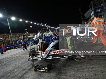 The car of Daniel Ricciardo of Australia and Visa Cash App RB F1 Team sits on the grid ahead of the F1 Grand Prix of Singapore at Marina Bay...