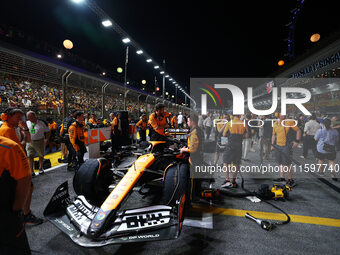 The car of Lando Norris of the United Kingdom and McLaren Formula 1 Team is on the grid ahead of the F1 Grand Prix of Singapore at Marina Ba...