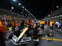 The car of Lando Norris of the United Kingdom and McLaren Formula 1 Team is on the grid ahead of the F1 Grand Prix of Singapore at Marina Ba...