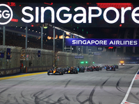 Lando Norris of the United Kingdom drives the McLaren Formula 1 Team MCL38 off the line on the opening lap during the F1 Grand Prix of Singa...